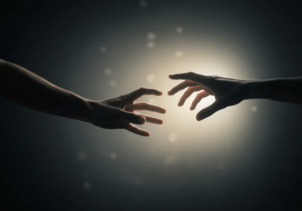 Person reaching out for professional mental health support