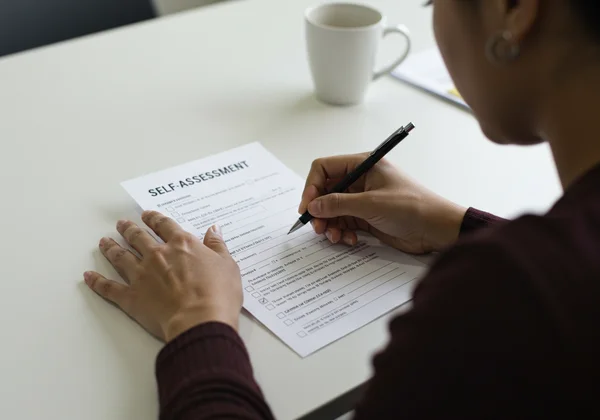 Person completing self assessment form